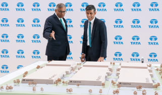 Natarajan Chandrasekaran and Rishi Sunak looking at a model factory